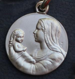 Médaille baptême Coeur de Marie en argent massif.